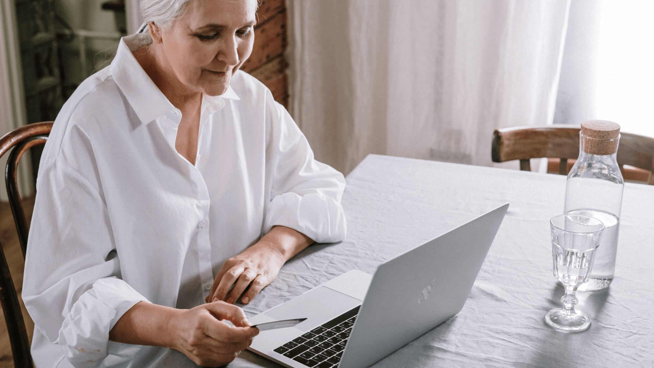 old woman in front of her laptop parkinson's case study
