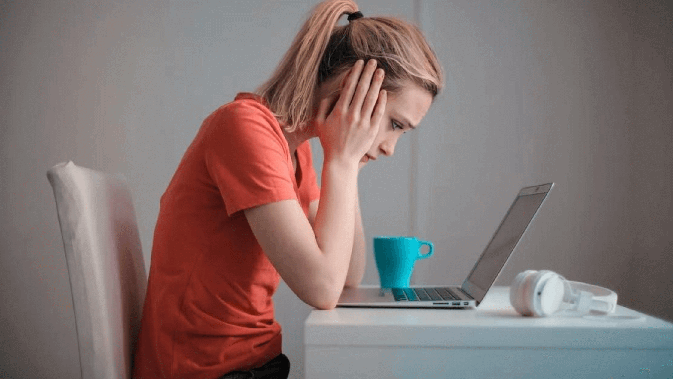 stress woman in front of her laptop ms clinical research
