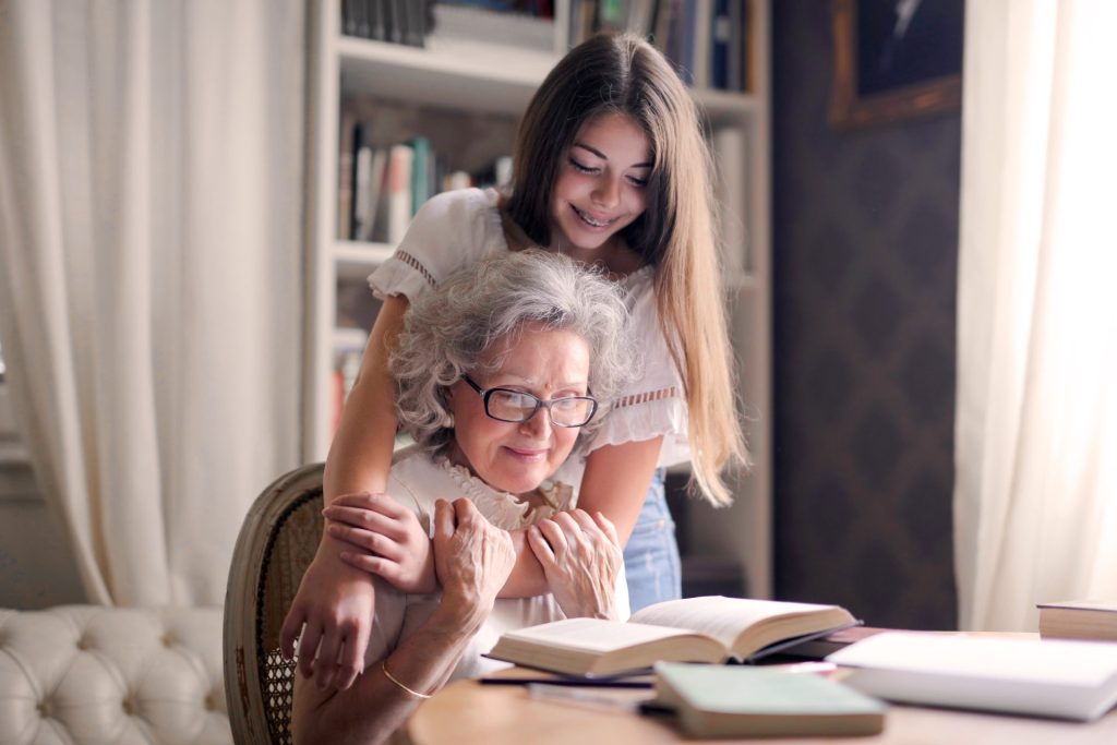 lady embracing her grandmother